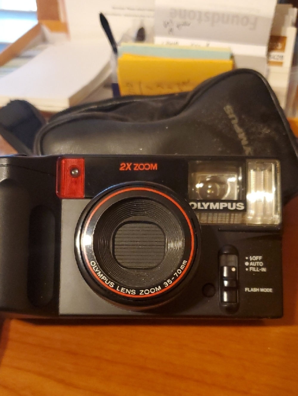 Olympus Black Camera with Red Trim Compact Zoom